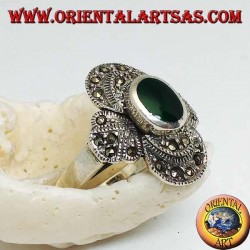 Silver ring with oval green agate on a round frame studded with marcasite