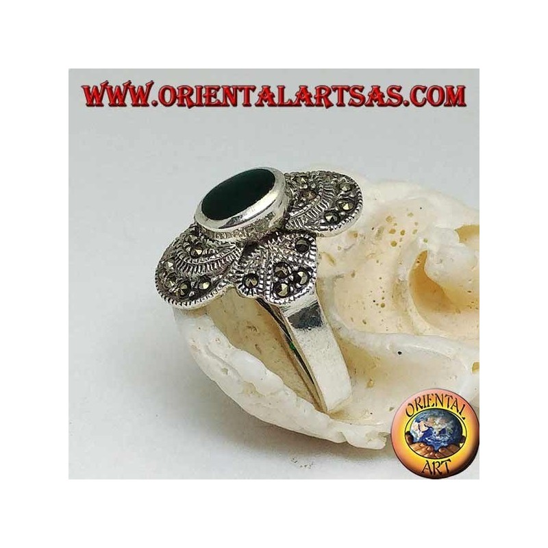 Silver ring with oval green agate on a round frame studded with marcasite
