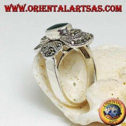 Silver ring with oval green agate on a round frame studded with marcasite