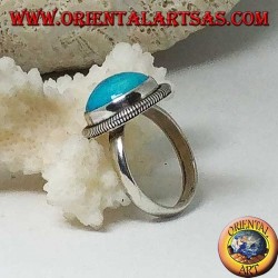 Silver ring with a round cabochon turquoise surrounded by a row of disks (14)