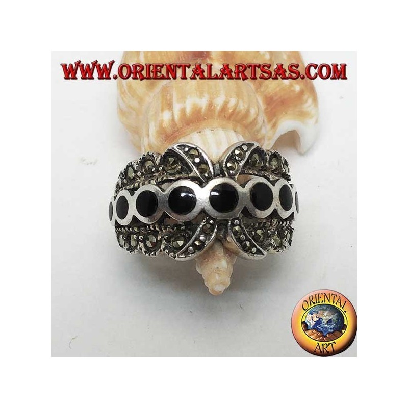 X-band silver ring with a row of round onyx discs between marcasite