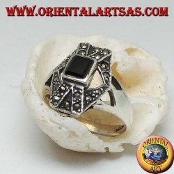 Silver ring with rectangular onyx overlapping X and hexagon with marcasite