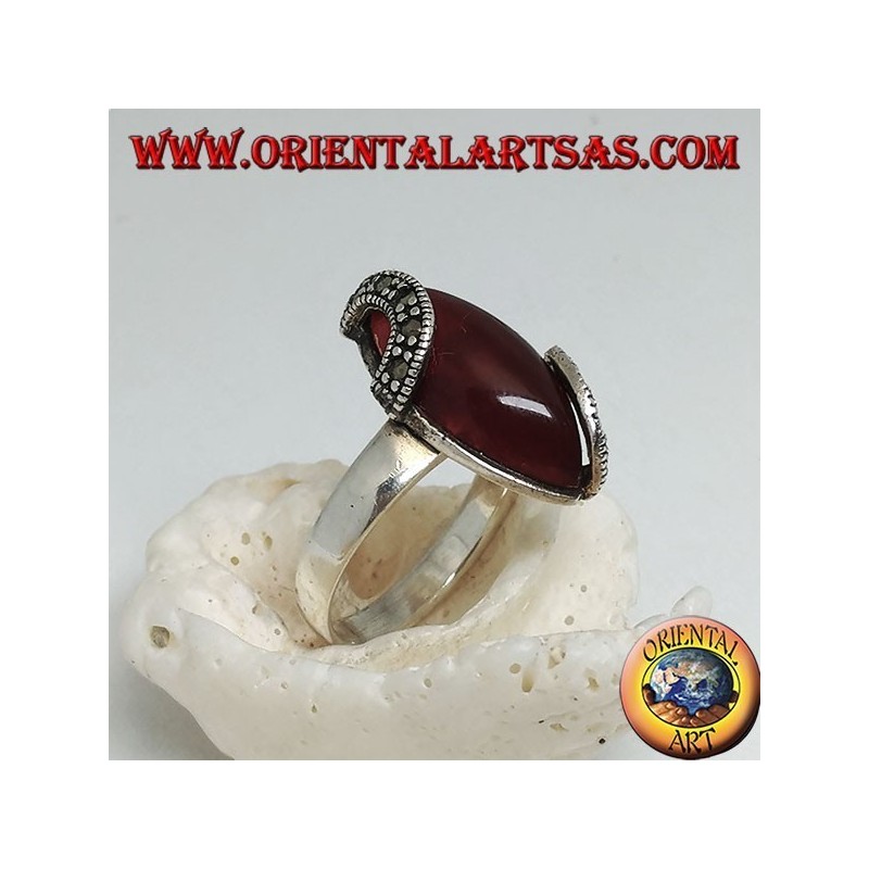 Silver ring with carnelian cabochon and two semicircles of