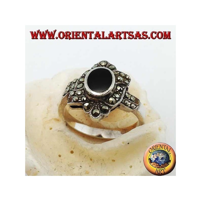 Silver ring with oval onyx surrounded by marcasite with an oblique band