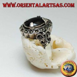 Silver ring with oval cabochon onyx set and surrounded by marcasite balls