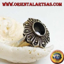 Silver flower ring with oval onyx and ten marcasite petals