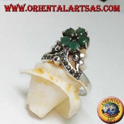 Silver ring with marcasite crown and at the top a flower of 5 natural round emeralds set