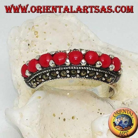 Silver ring with a row of corals set between two rows of marcasite