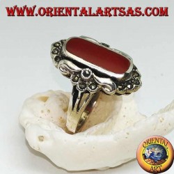 Silver ring with oval carnelian surrounded by marcasite and smooth silver small stones