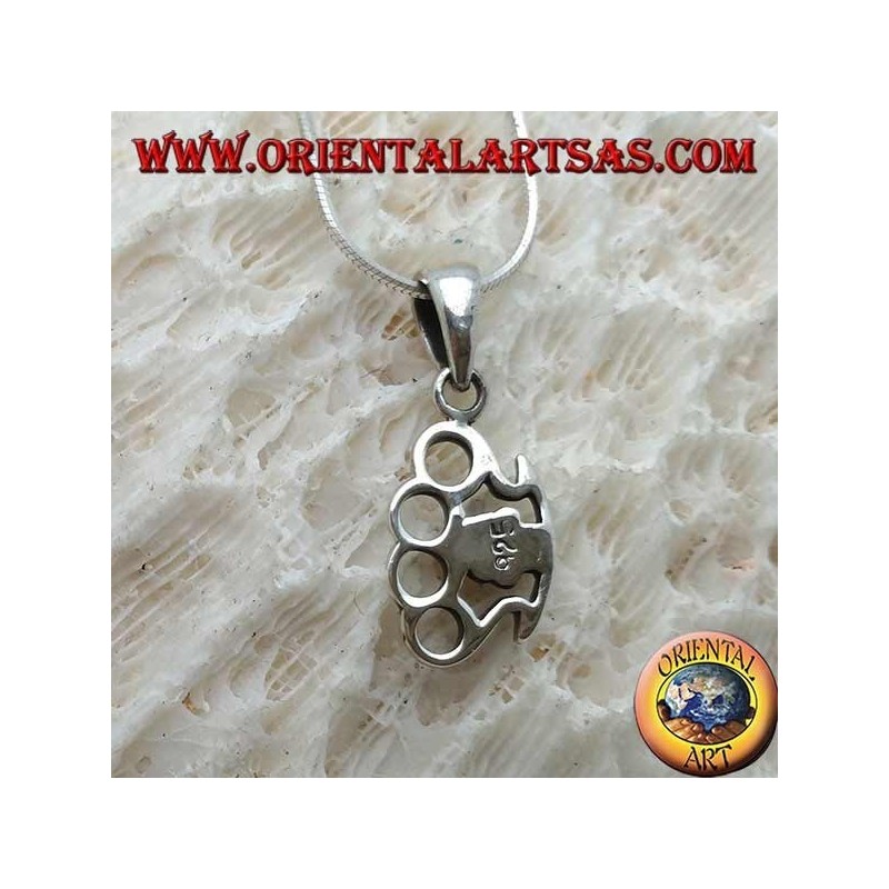 Pendentif en argent en forme de truelle avec crâne