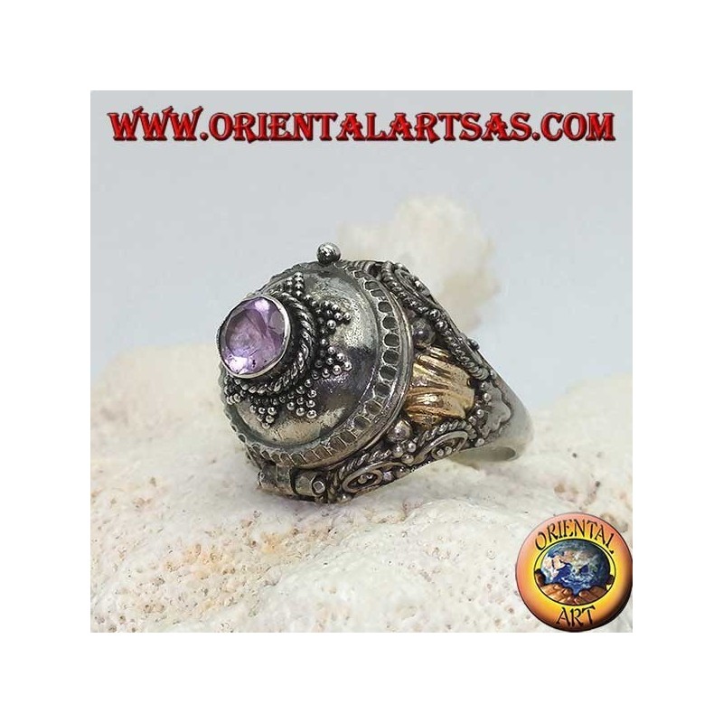 Silver box ring with round amethyst on eight-pointed star and gold plate on the sides