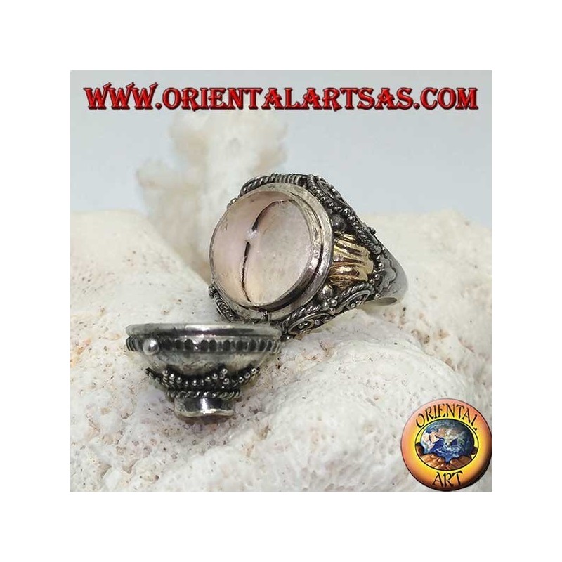 Silberner Boxring mit rundem Amethyst auf achtzackigem Stern und goldener Platte an den Seiten