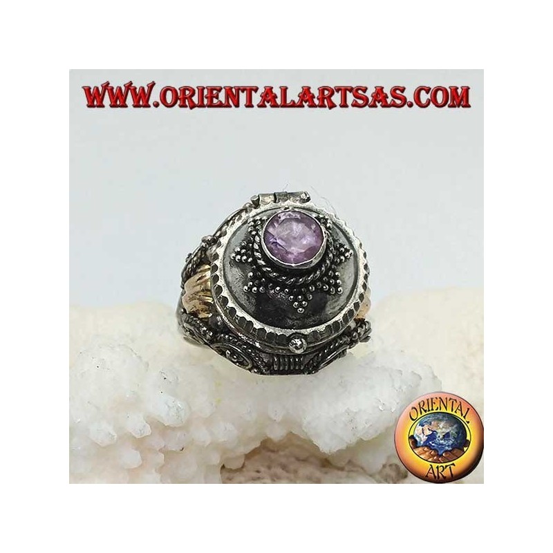 Silver box ring with round amethyst on eight-pointed star and gold plate on the sides