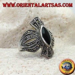 Silver ring with shuttle onyx on a rounded cross frame studded with marcasite