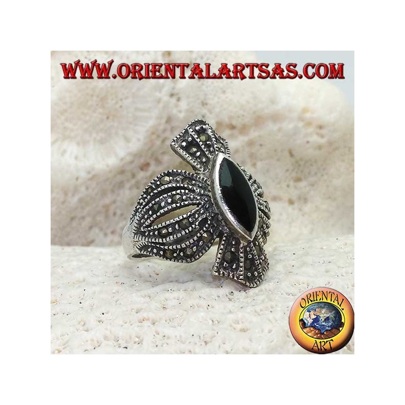Silver ring with shuttle onyx on a rounded cross frame studded with marcasite