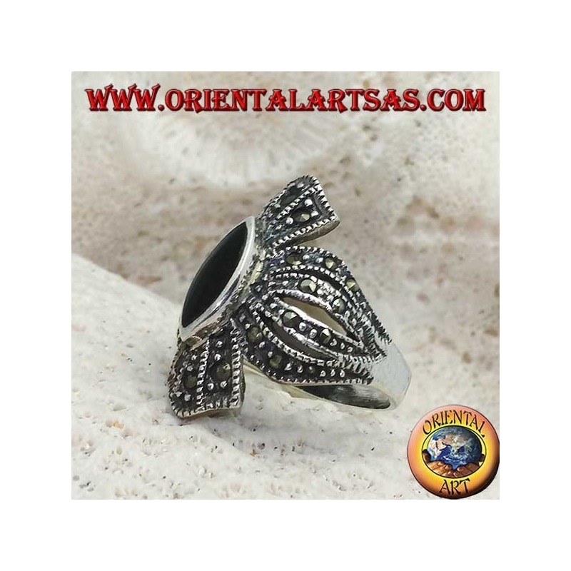 Silver ring with shuttle onyx on a rounded cross frame studded with marcasite