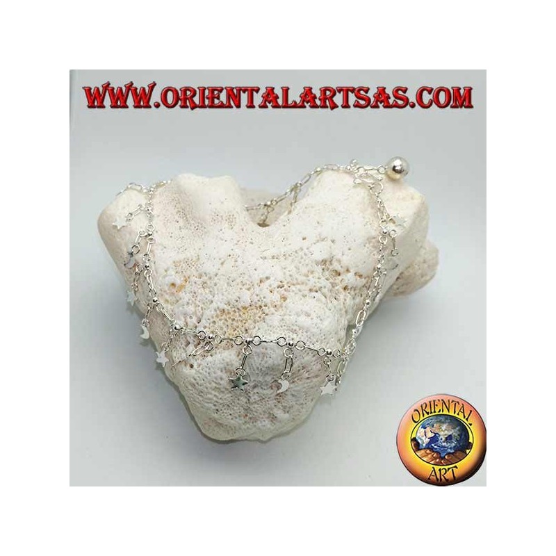 Bracelet de cheville en argent avec alternance d'étoiles et de lunes suspendues et une petite cloche