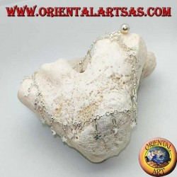 Tobillera plateada con estrellas y lunas colgantes alternas y una pequeña campana