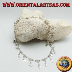 Silver anklets with flower and leaf pendants