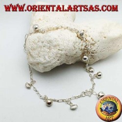 Silver anklet with alternating hanging bells and shells