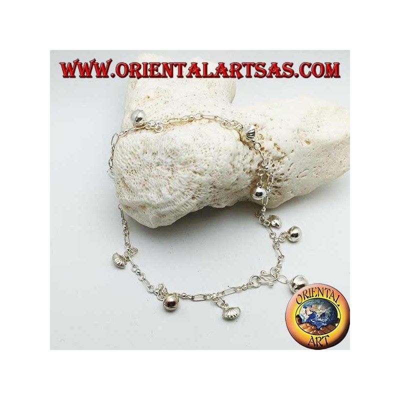 Silver anklet with alternating hanging bells and shells
