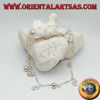 Silver anklet with alternating spirals and hanging bells