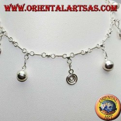 Silver anklet with alternating spirals and hanging bells