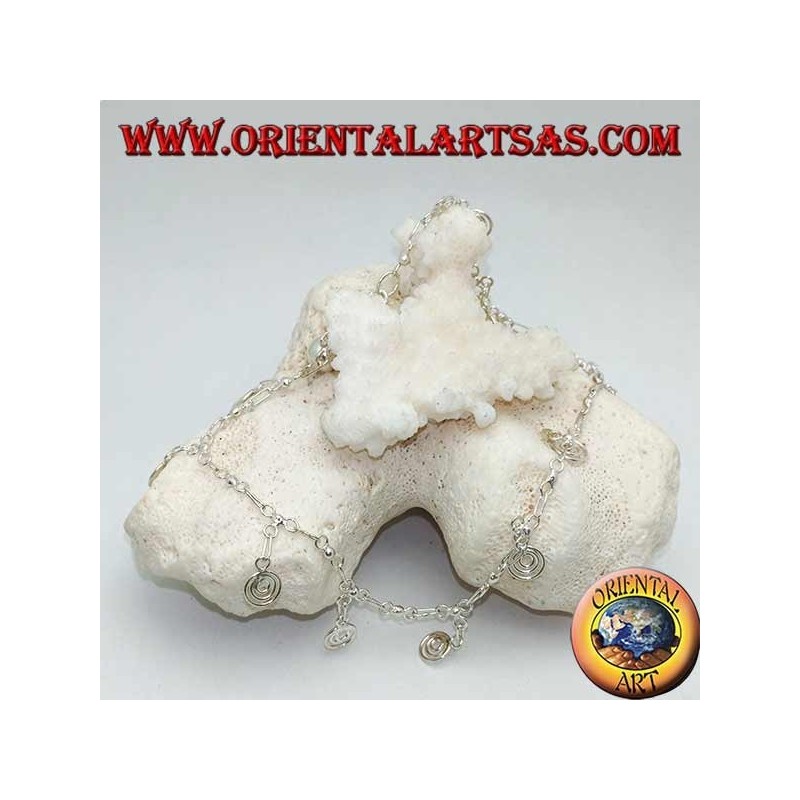 Tobillera plateada con espirales colgantes con campana