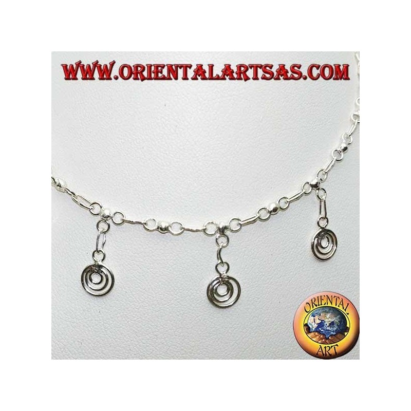 Silver anklet with hanging spirals with a bell