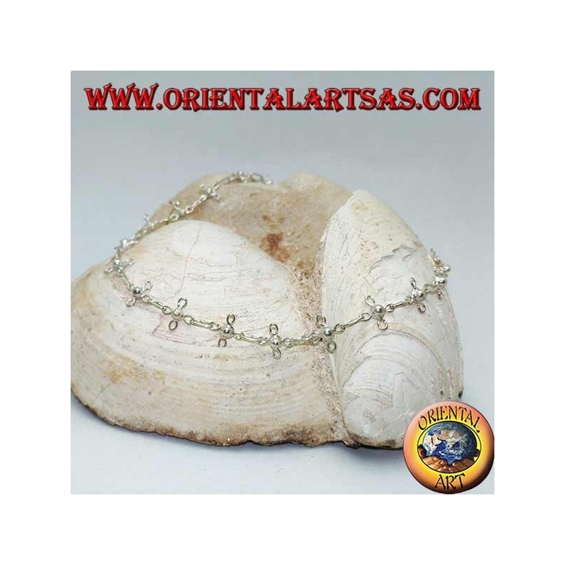 Bracelet de cheville en argent avec trèfles à quatre feuilles stylisés et cloche