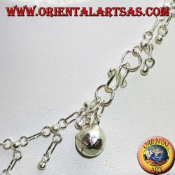 Silver anklet with hanging balls and a bell