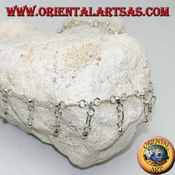 Tobillera plateada con bolas colgantes y una campana