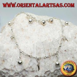 Tobillera plateada con teclas colgantes y campanas alternadas