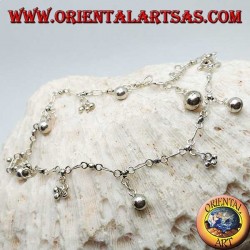 Bracelet de cheville en argent avec des groupes de trois boules et des cloches suspendues alternées