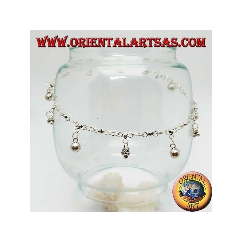 Silver anklet with groups of three balls and alternating hanging bells