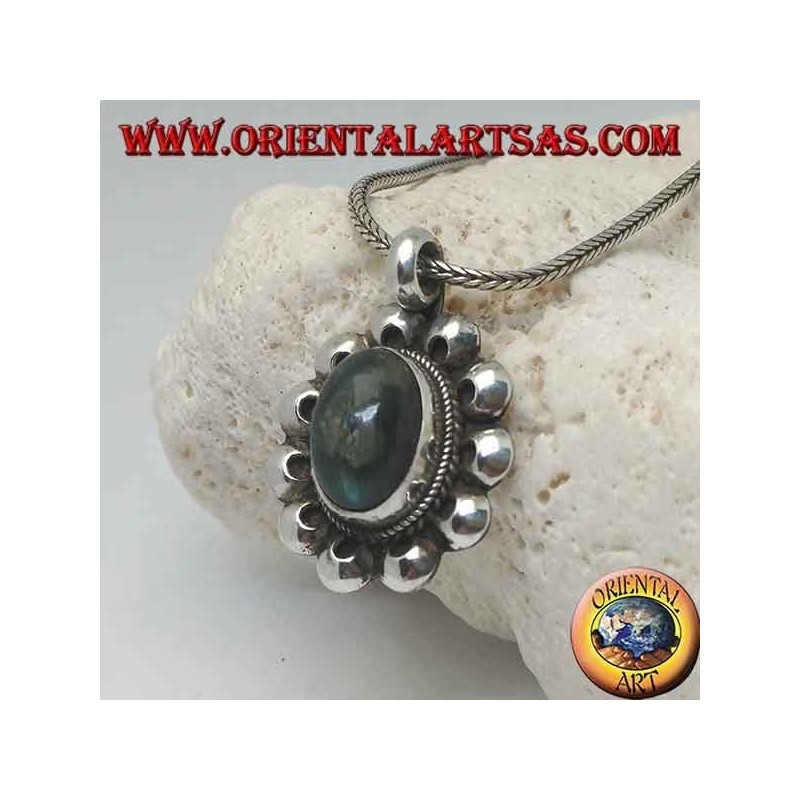 Silver pendant with oval cabochon labradorite surrounded by interlacing and perforated discs