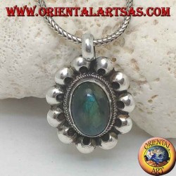 Silver pendant with oval cabochon labradorite surrounded by interlacing and perforated discs