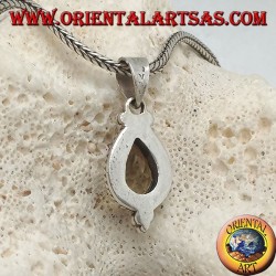 Colgante de plata con topacio amarillo natural rodeado de entrelazados y bolas.