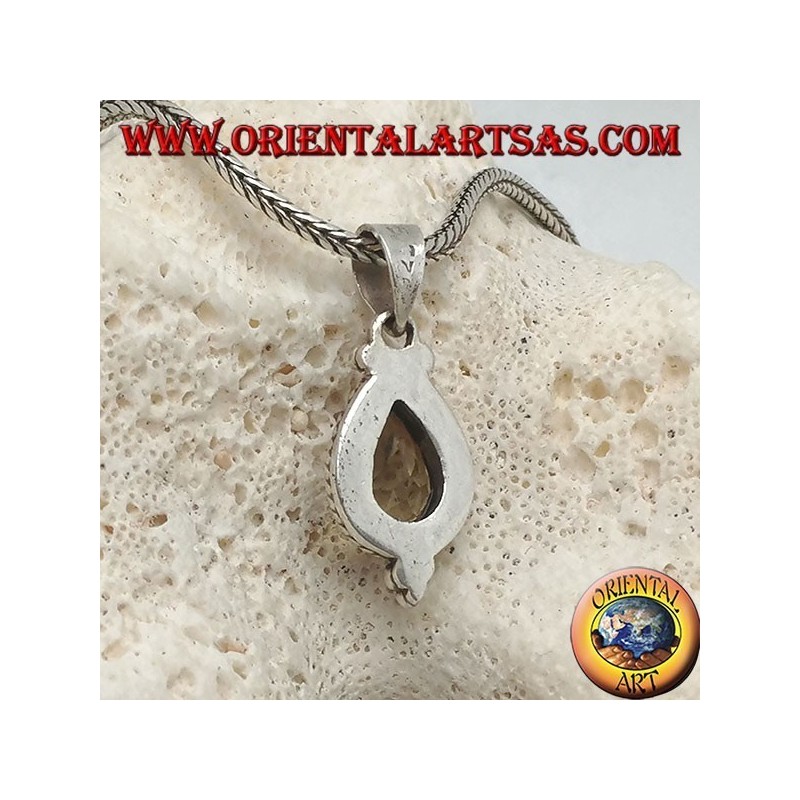 Colgante de plata con topacio amarillo natural rodeado de entrelazados y bolas.