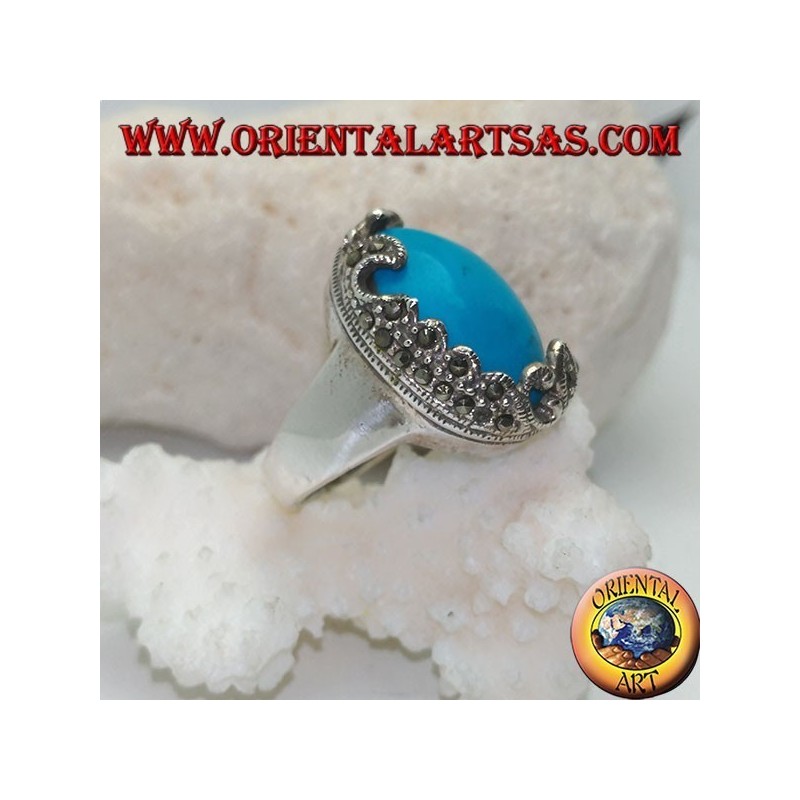 Silver ring with oval cabochon turquoise and decorations with floral marcasites on one side only