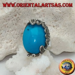 Anillo de plata con cabujón oval turquesa y decoraciones con marcasitas florales en un solo lado