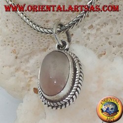 Silver pendant with an elongated oval moonstone surrounded by subtle weaves