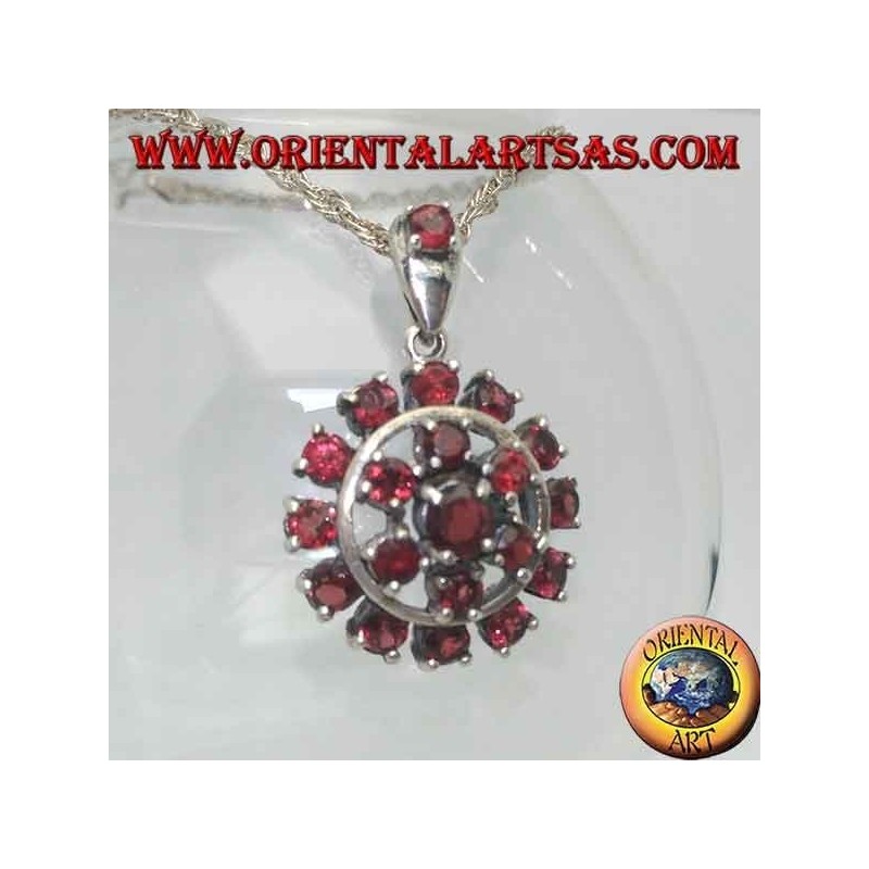 Round garnet silver pendant surrounded by a six-pointed star and a circle of garnets