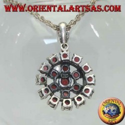 Round garnet silver pendant surrounded by a six-pointed star and a circle of garnets