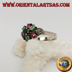 Silver hexagonal flower ring with emeralds and round natural rubies set and narcassite on the sides