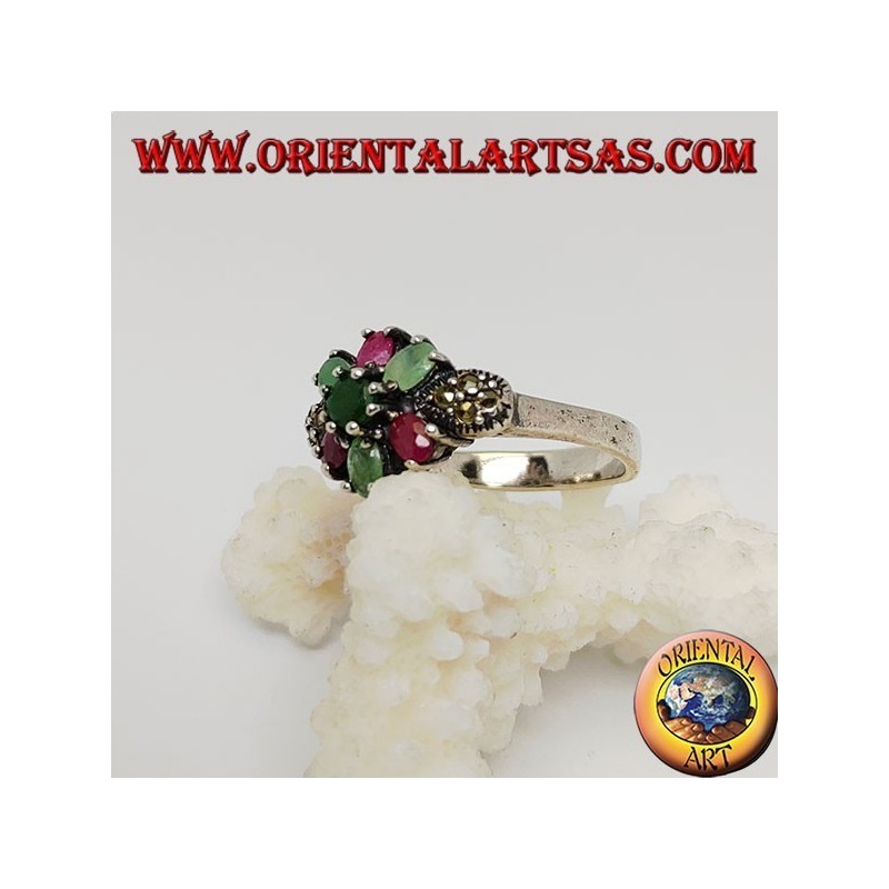 Silver hexagonal flower ring with emeralds and round natural rubies set and narcassite on the sides
