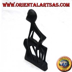 Sculpture of a couple in Kamasutra (London Bridge or drawbridge position)