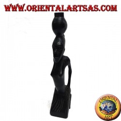 Sculpture of a water pumping woman (water carrier) kneeling in ebony wood