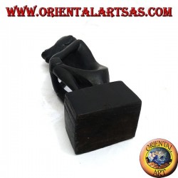 Sculpture of a seated thinker with bent legs in ebony wood