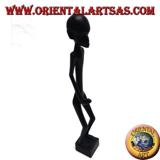 Sculpture of a man who masturbates standing in ebony wood